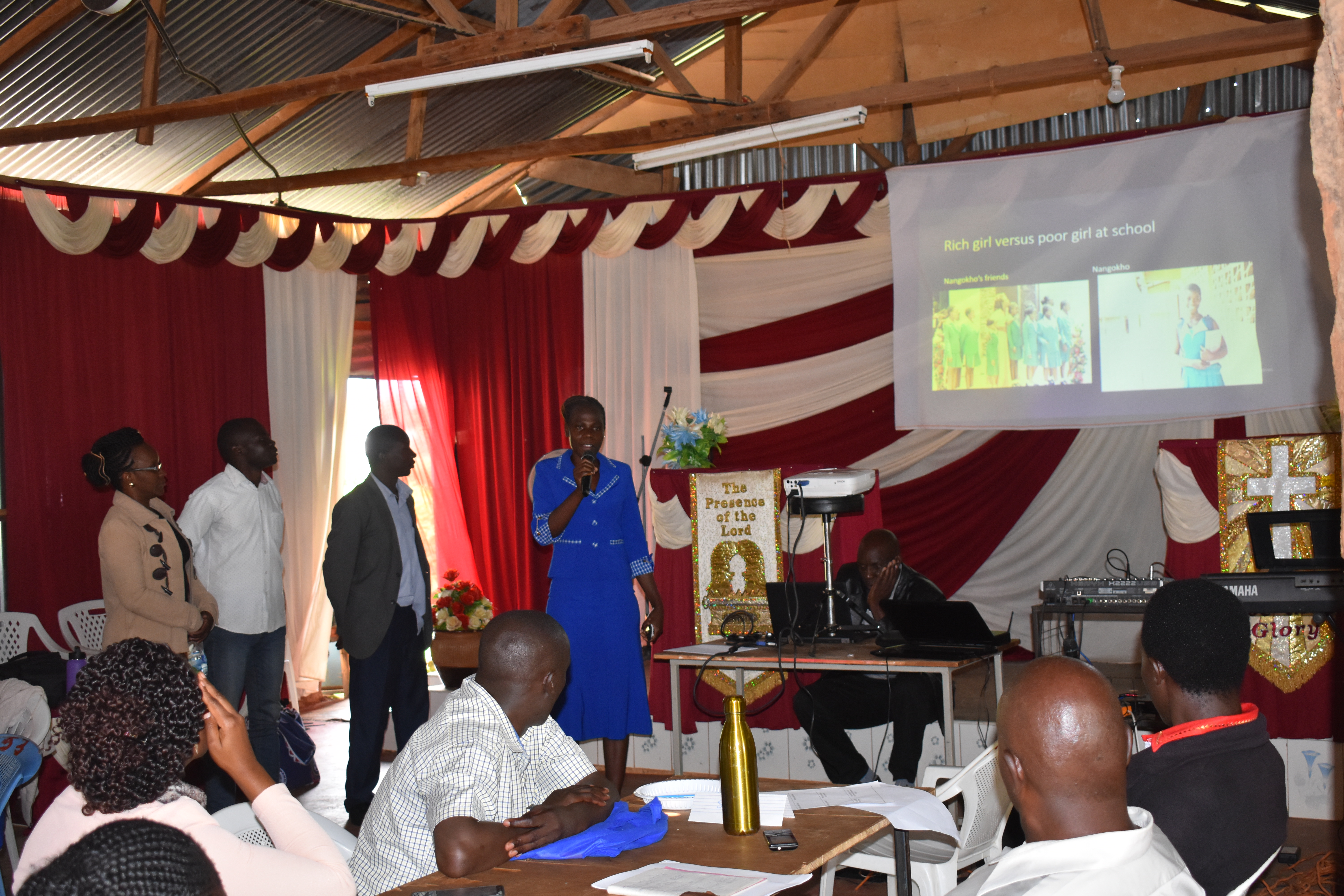 Teachers in Kenya present their digital stories during a professional development workshop