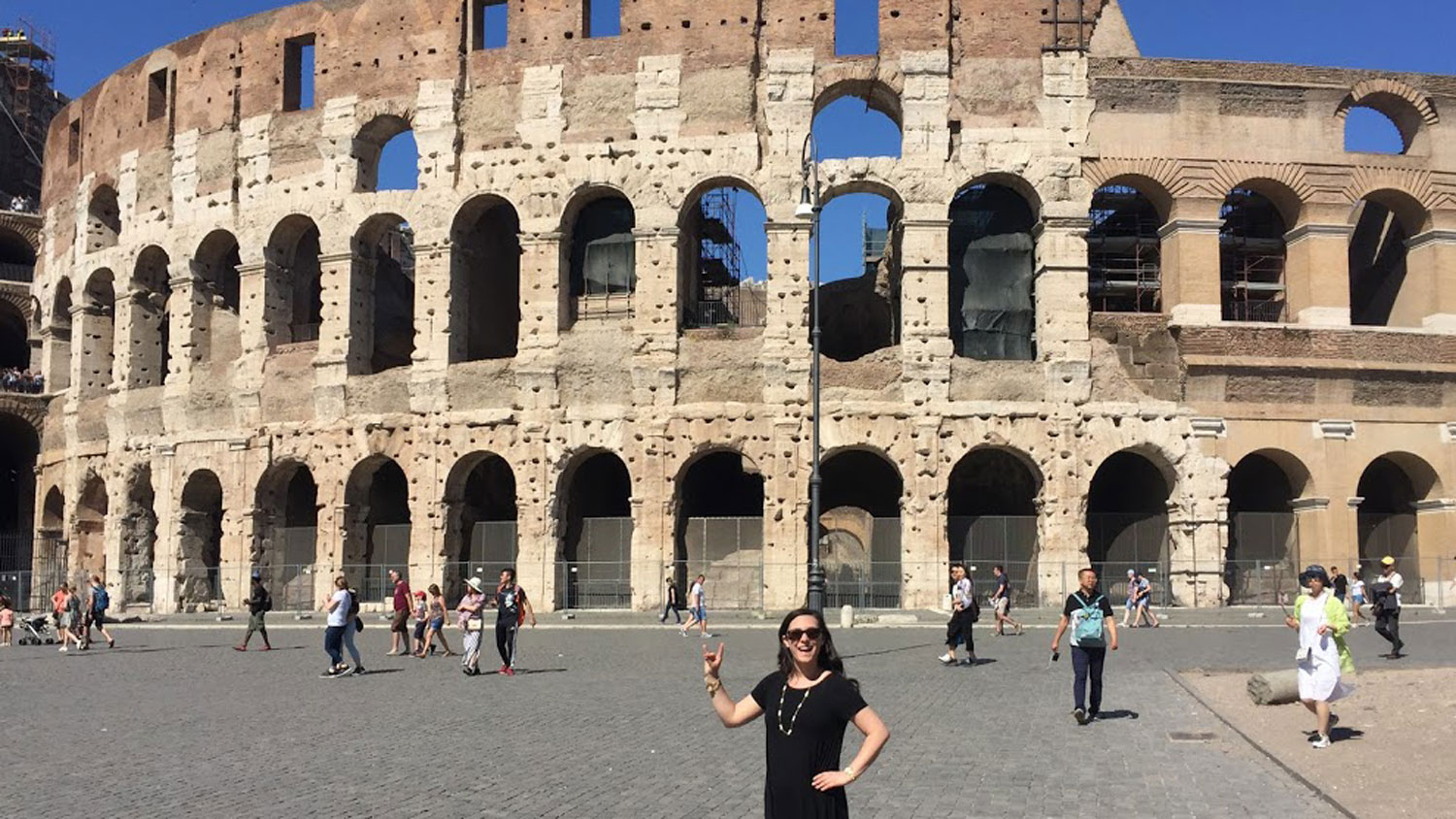 College of Education student Kelsi Harris poses in front of the Colosseum in Rome.