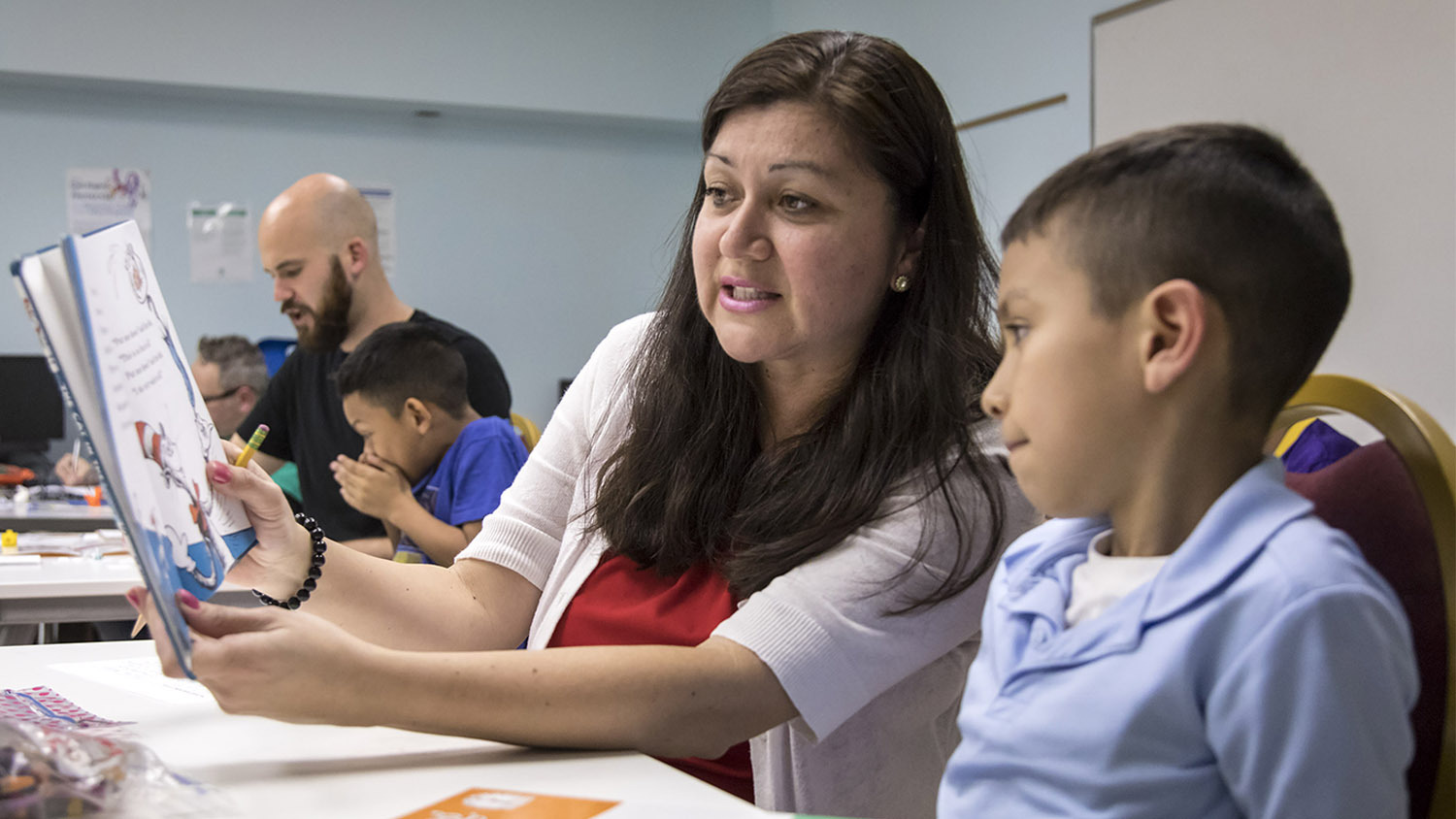 A tutor working with a student
