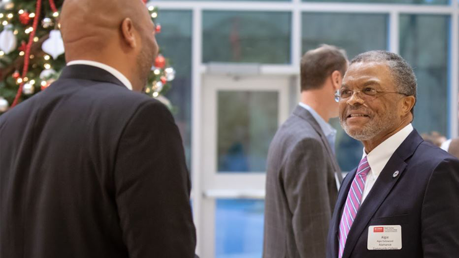 Algie Gatewood working with a student in the NC State College of Education's community college leadership program