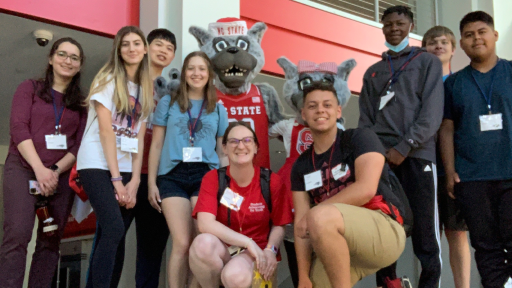 NC State College of Education undergraduate student Kailey Rea with students in the SATELLITE camp. 