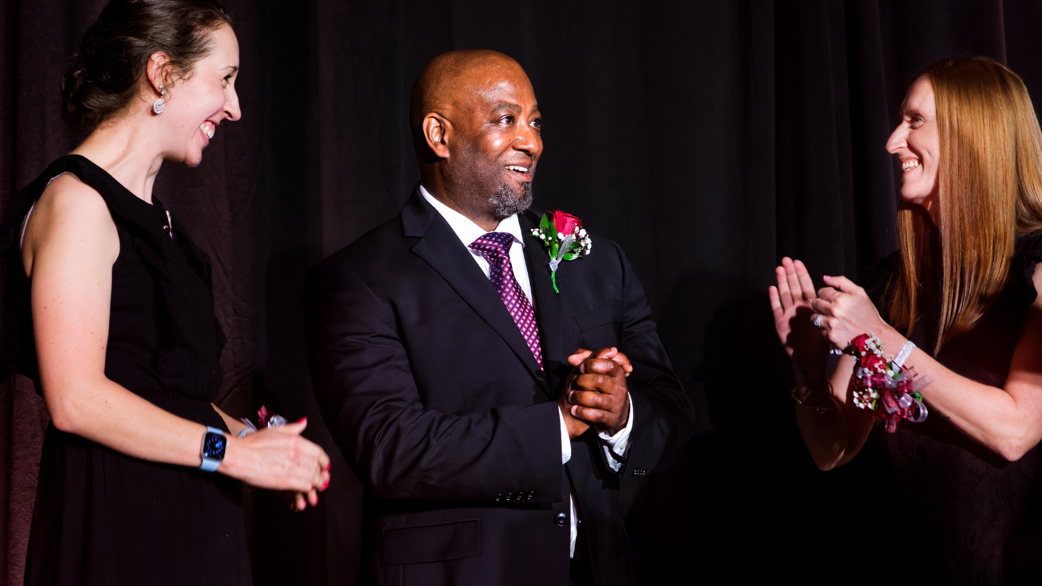 Terry Hennings on stage being named Wake County Teacher of the Year