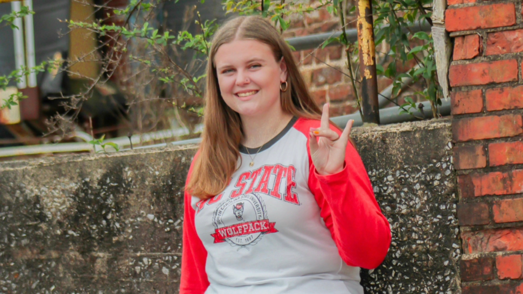 Abbi Roof in an NC State shirt.