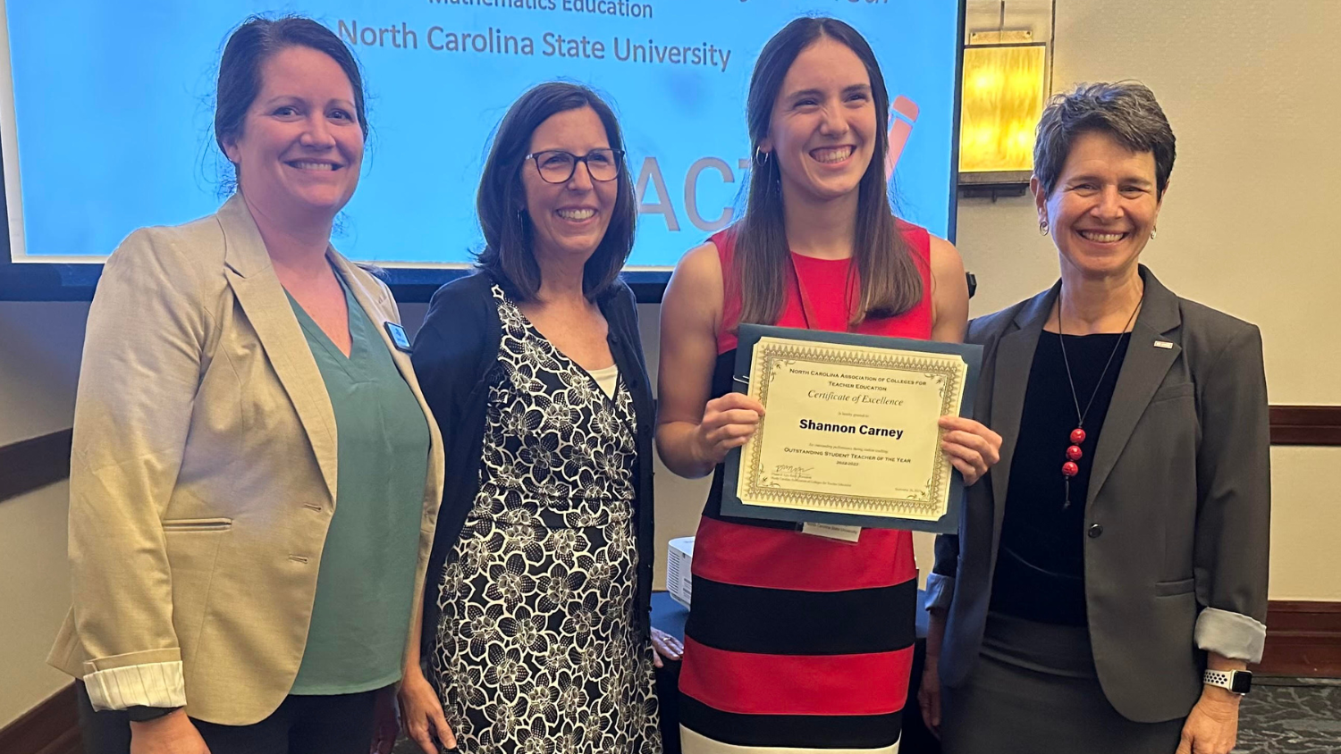 Shannon Carney receiving the 2023 North Carolina Association of Colleges for Teacher Education Student Teacher of the Year Award.