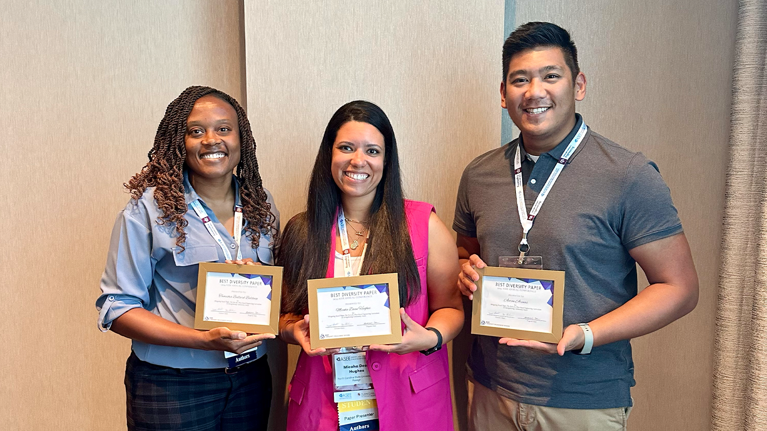 Tameshia Baldwin, Micaha Dean Hughes and-Aaron Arenas with their Best Diversity Paper awards.
