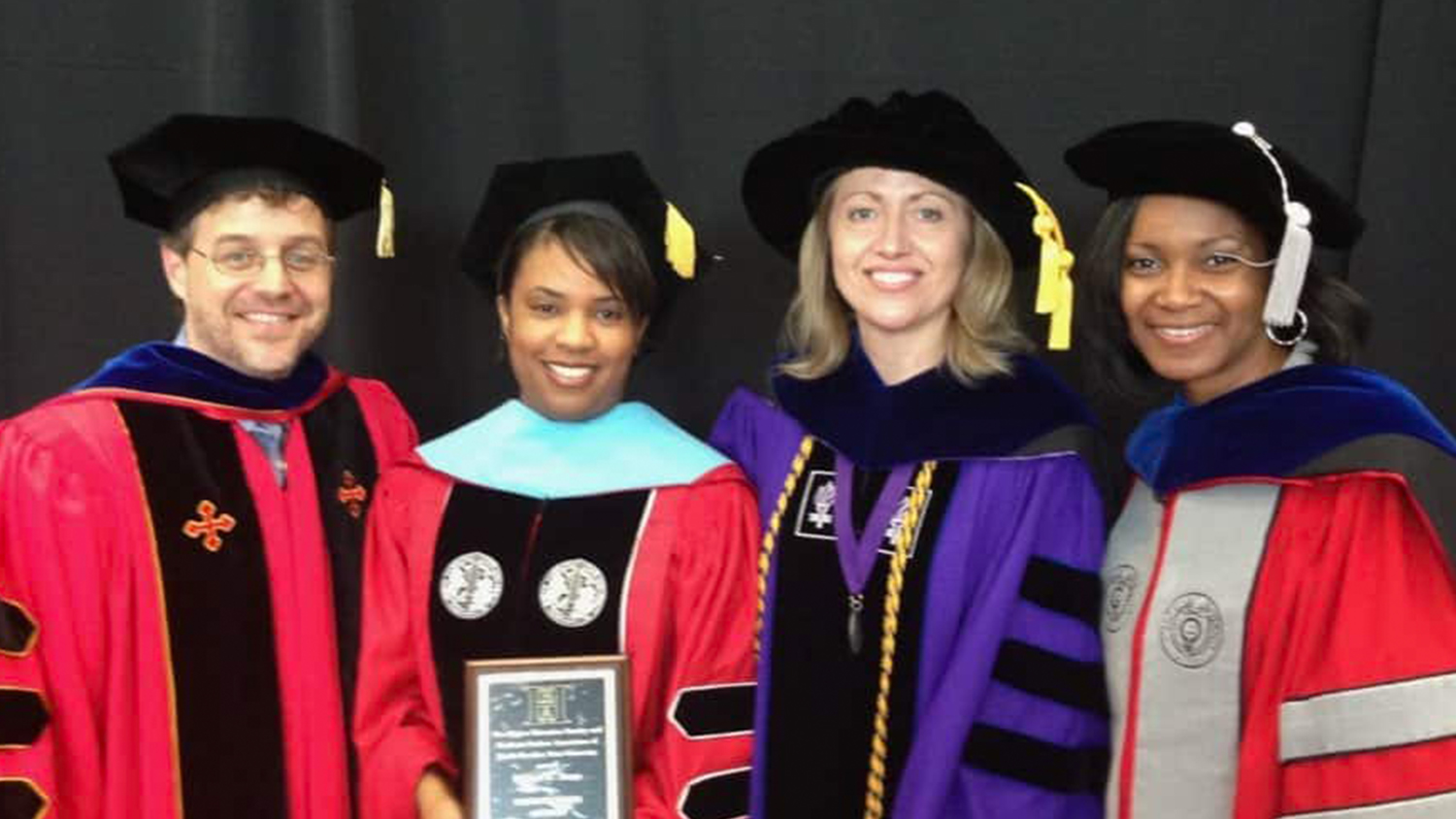 Karrie Dixon, second from left, with College of Education faculty.