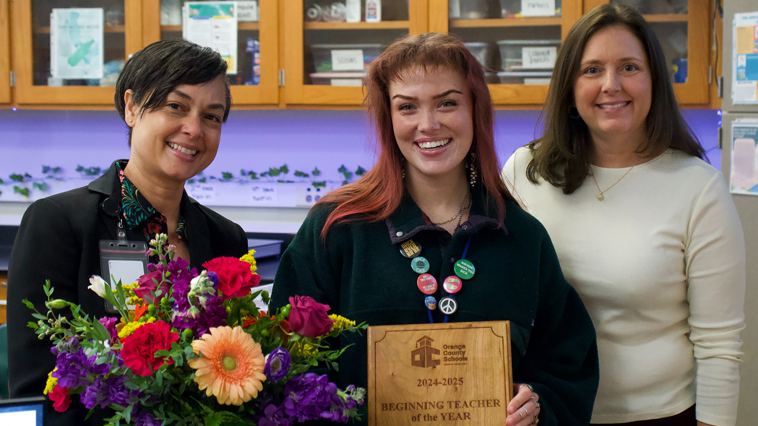 A photo of Layla Allen receiving the Orange County Schools 2024-25 Beginning Teacher of the Year award.