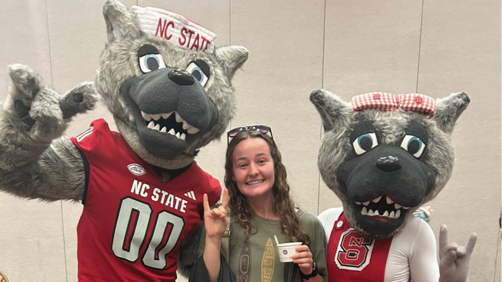 Sydney Johnson with Mr. and Ms. Wuf.