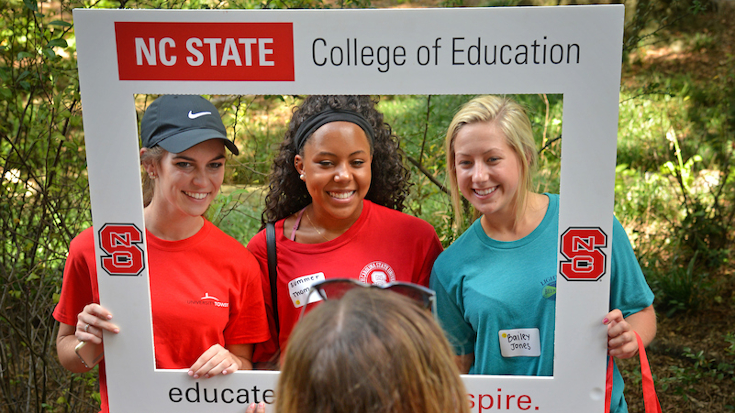 College of Education students pose for a photo during Wolfpack Welcome Week celebration outside Poe Hall.