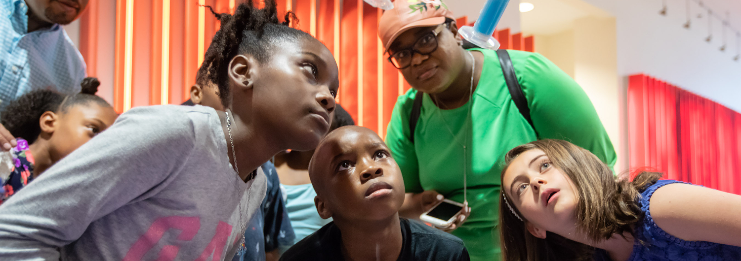 students watching a science experiment