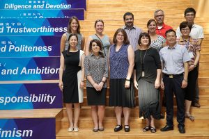 Hiller Spires and delegation at Suzhou North America High School.