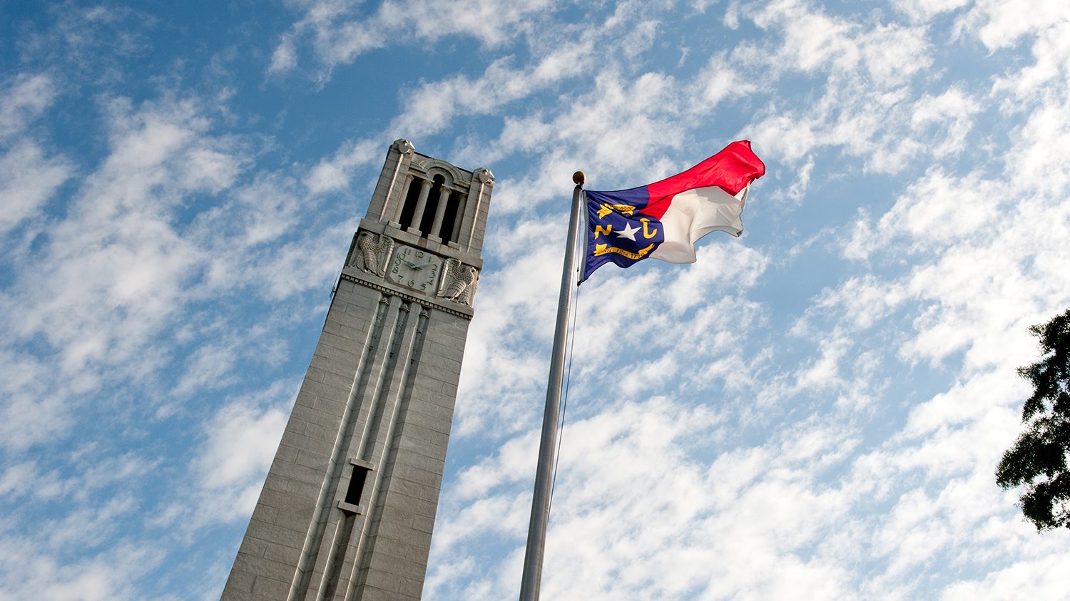 Belltower and North Carolina flag.