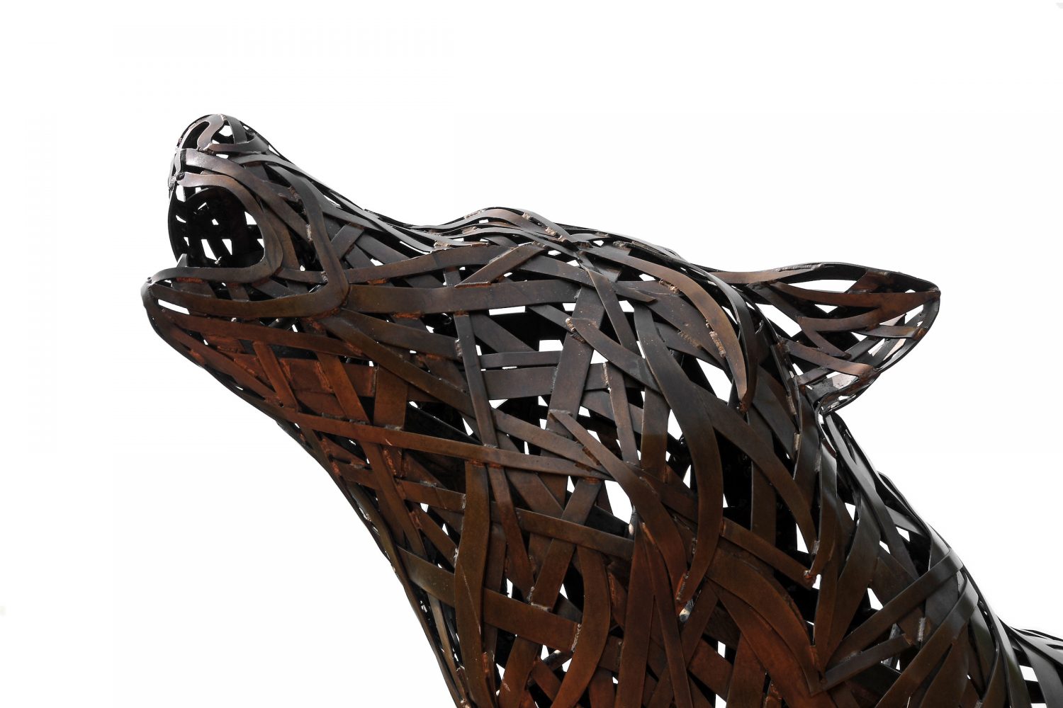 A photo of a wolf statue on campus