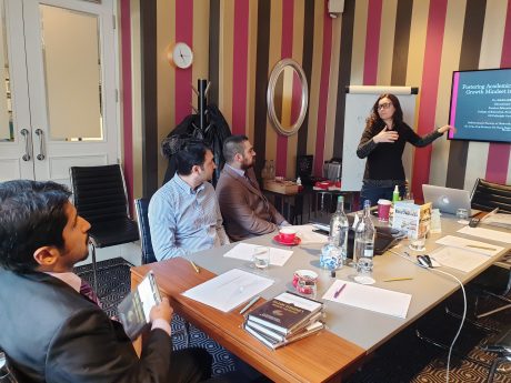 A photo of Associate Professor Margareta Thomson presenting her research during her Fulbright year in Romania.