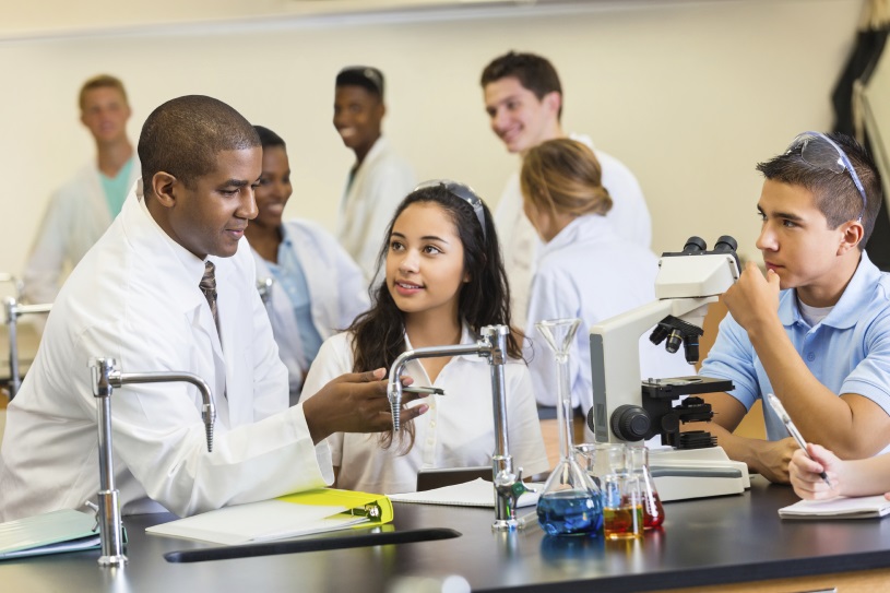 Teacher and science students